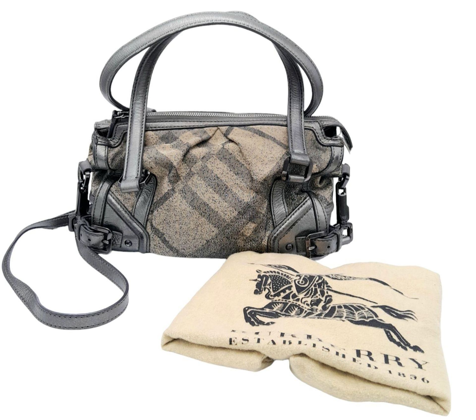 A Burberry Metallic Grey Smoke Check Bag. Canvas exterior with leather trim, leather straps, black- - Image 3 of 9