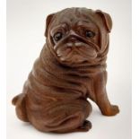 A very collectable, exquisitely hand carved on box wood Pug dog with amazing detail. Probably of