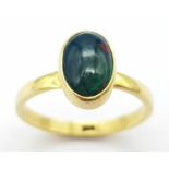 A Black Opal Gilded 925 Silver Ring. Size M/N, 2.1g total weight.