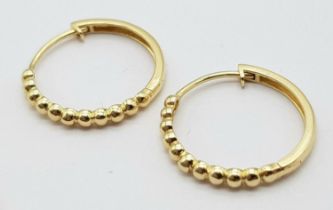 A Pair of 14k Gold Designer Massika Earrings. 1.8g total weight.