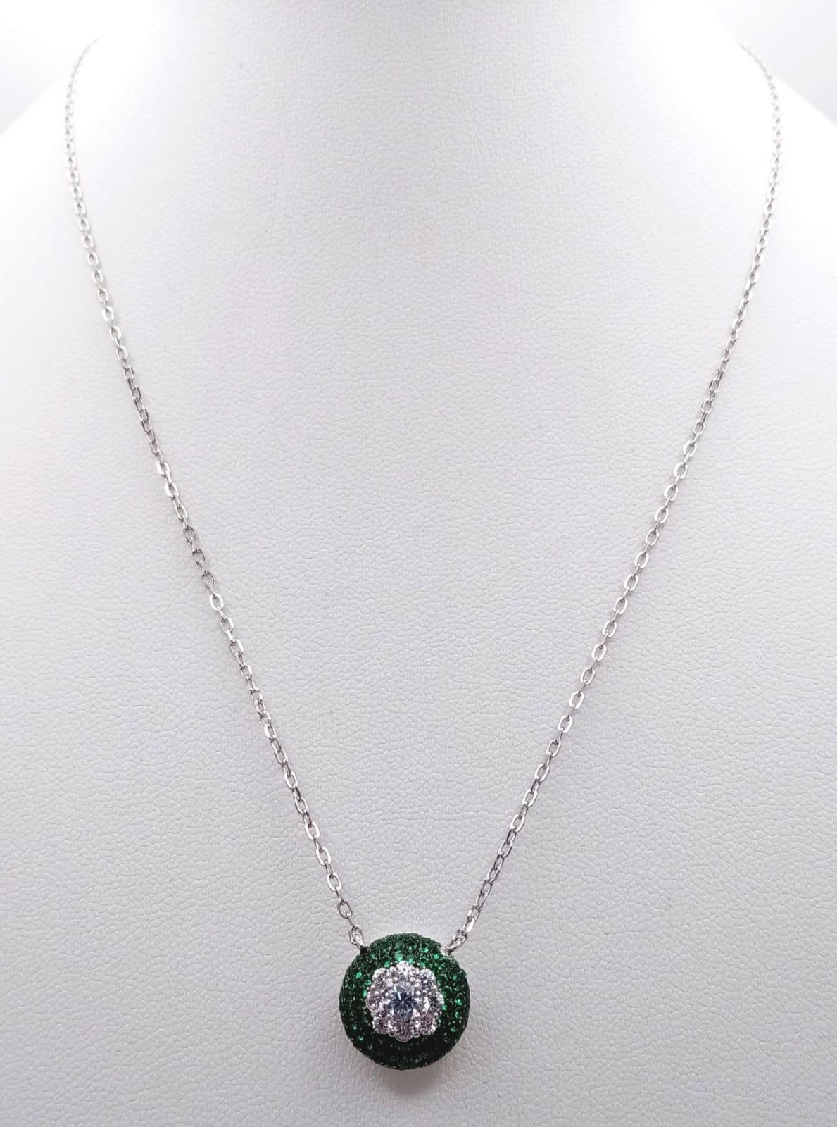 A 925 Silver, Green and White Stone Pendant on a 925 Silver Disappearing Necklace. - Image 2 of 6