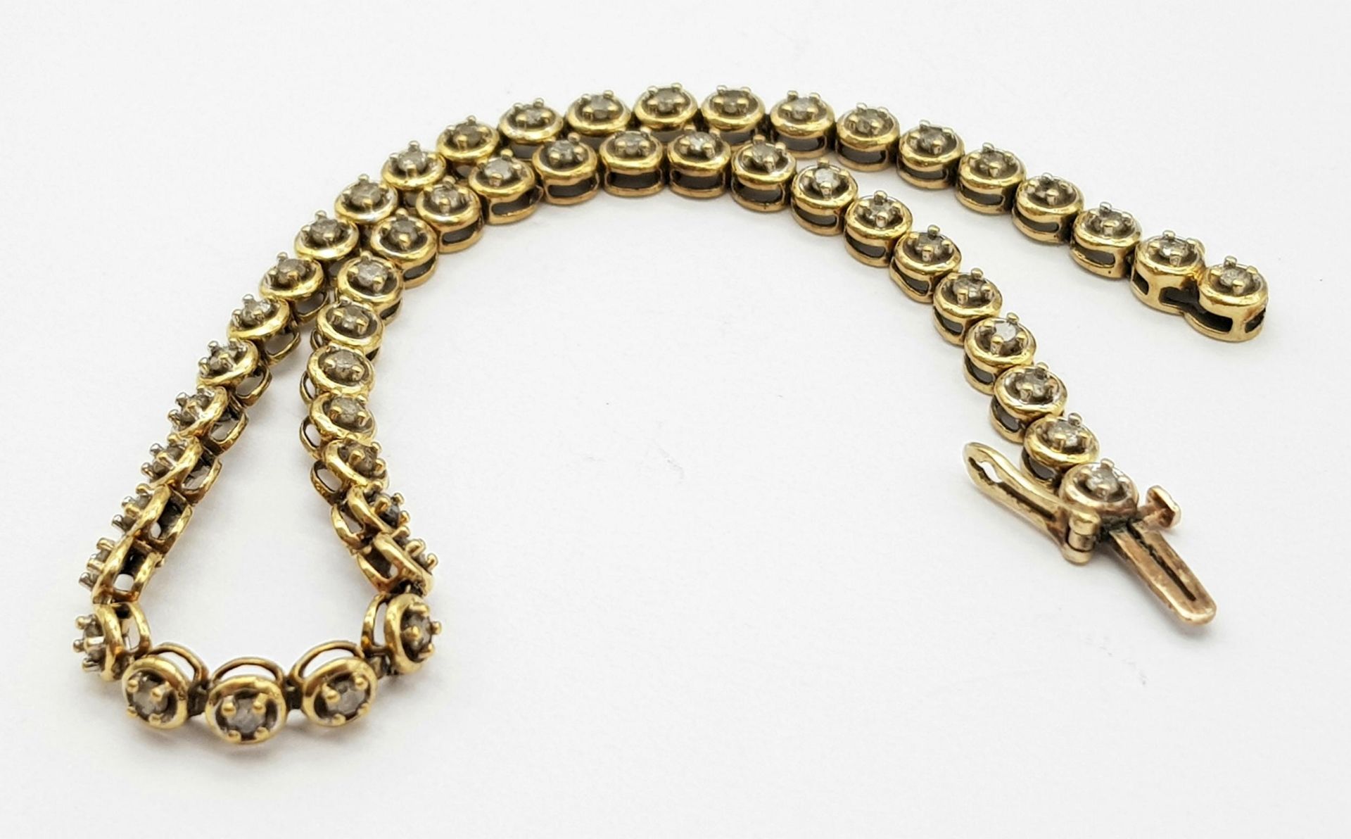 A Vintage 9K Yellow Gold Diamond Tennis Bracelet. 19cm. 5.8g total weight. - Image 6 of 7