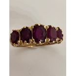 Magnificent 9 carat GOLD and AMETHYST RING. Consisting 5 x Graduated Oval Cut AMETHYSTS mounted to