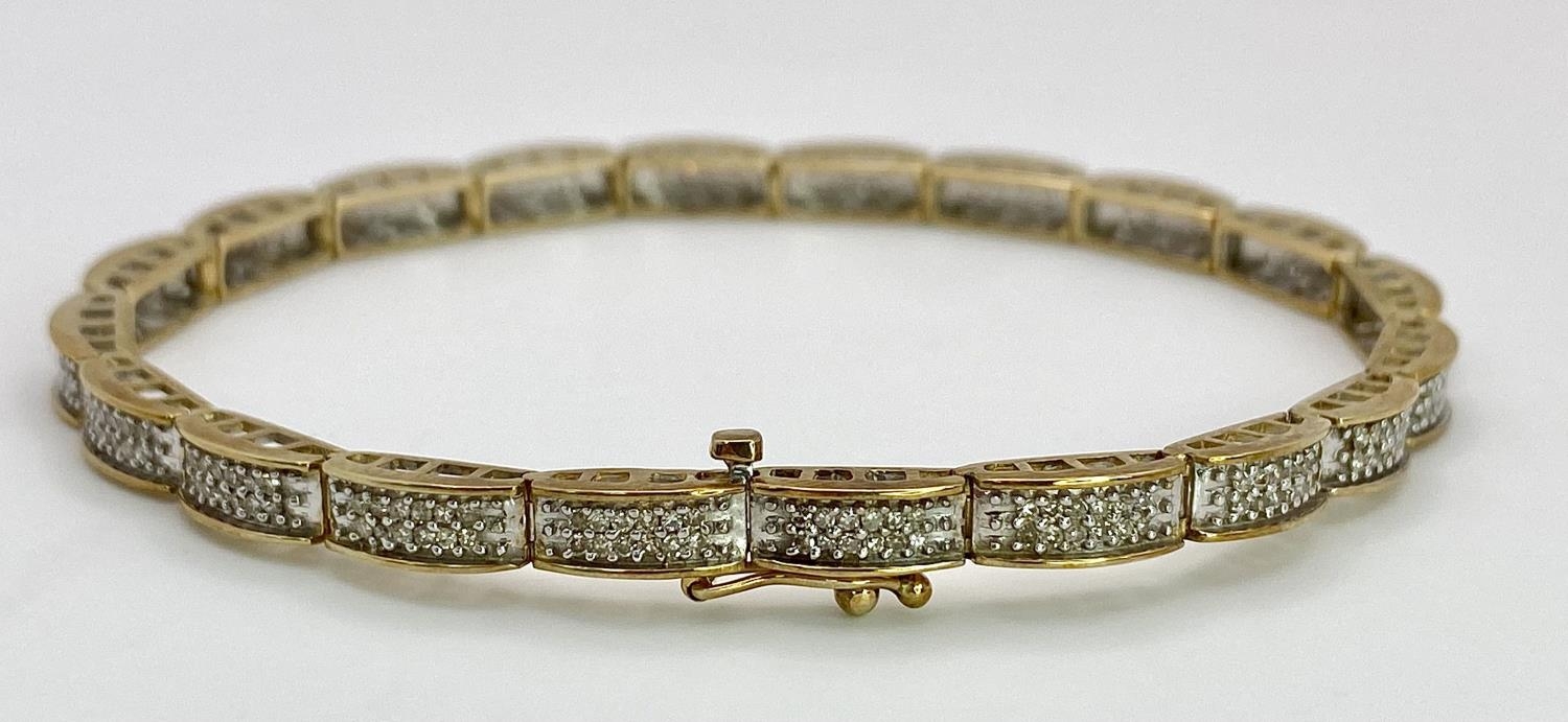 A 9K YELLOW GOLD DIAMOND SET BRACELET 1CT 10.1G , 18.8cm length. SC 9027