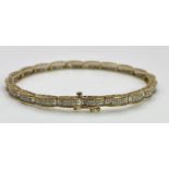 A 9K YELLOW GOLD DIAMOND SET BRACELET 1CT 10.1G , 18.8cm length. SC 9027