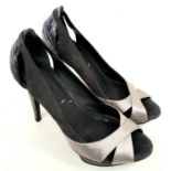 A pair of lightly used high heel (4") ladies shoes by Max Mara