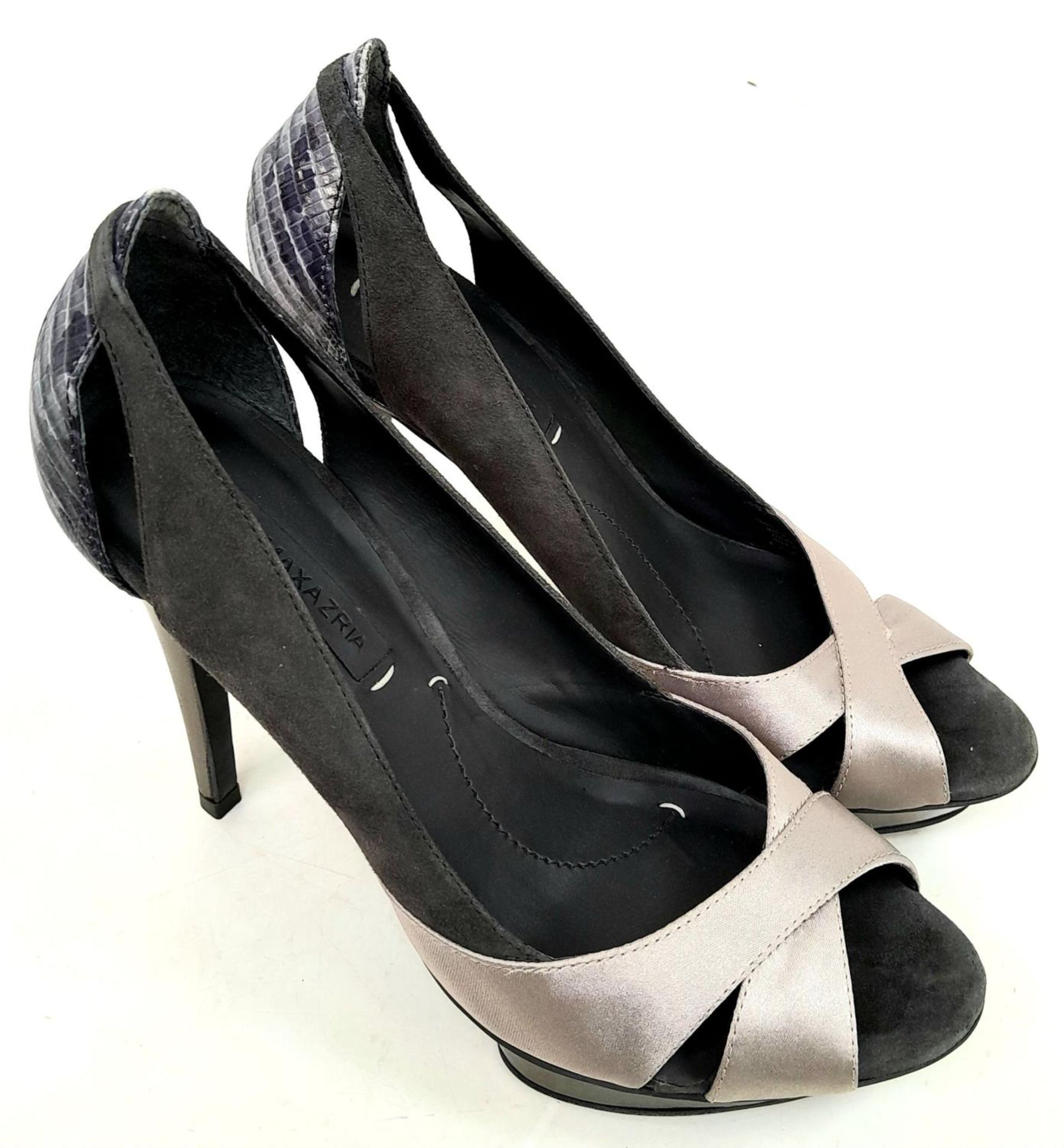 A pair of lightly used high heel (4") ladies shoes by Max Mara
