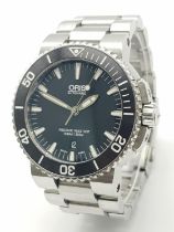 An Oris Automatic Divers Watch. Pressure resistant to 300M - Model 7653. Stainless steel bracelet