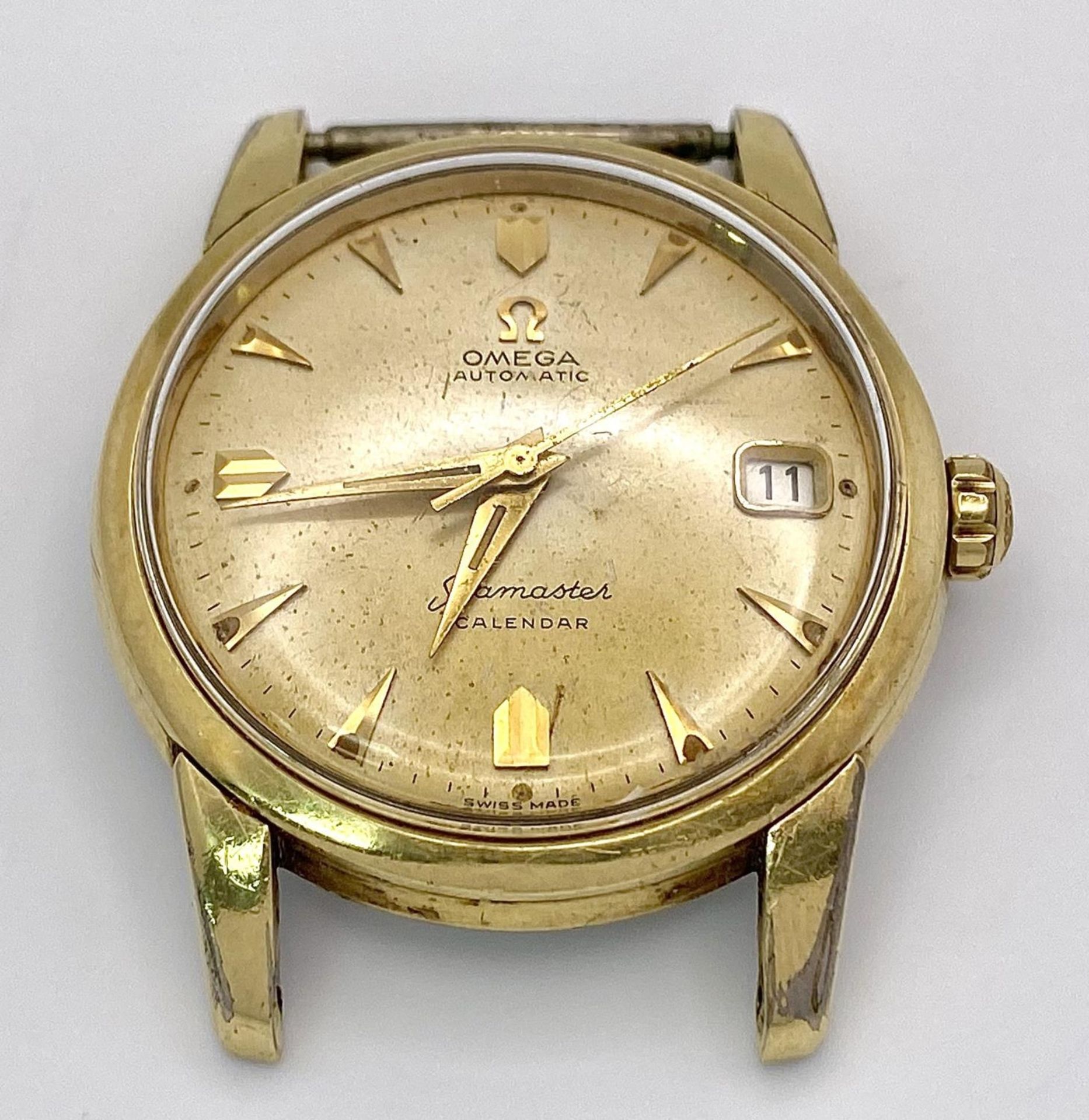 A Vintage Omega Seamaster Calendar Automatic Watch Case - 34mm. Gilded dial with date window. In