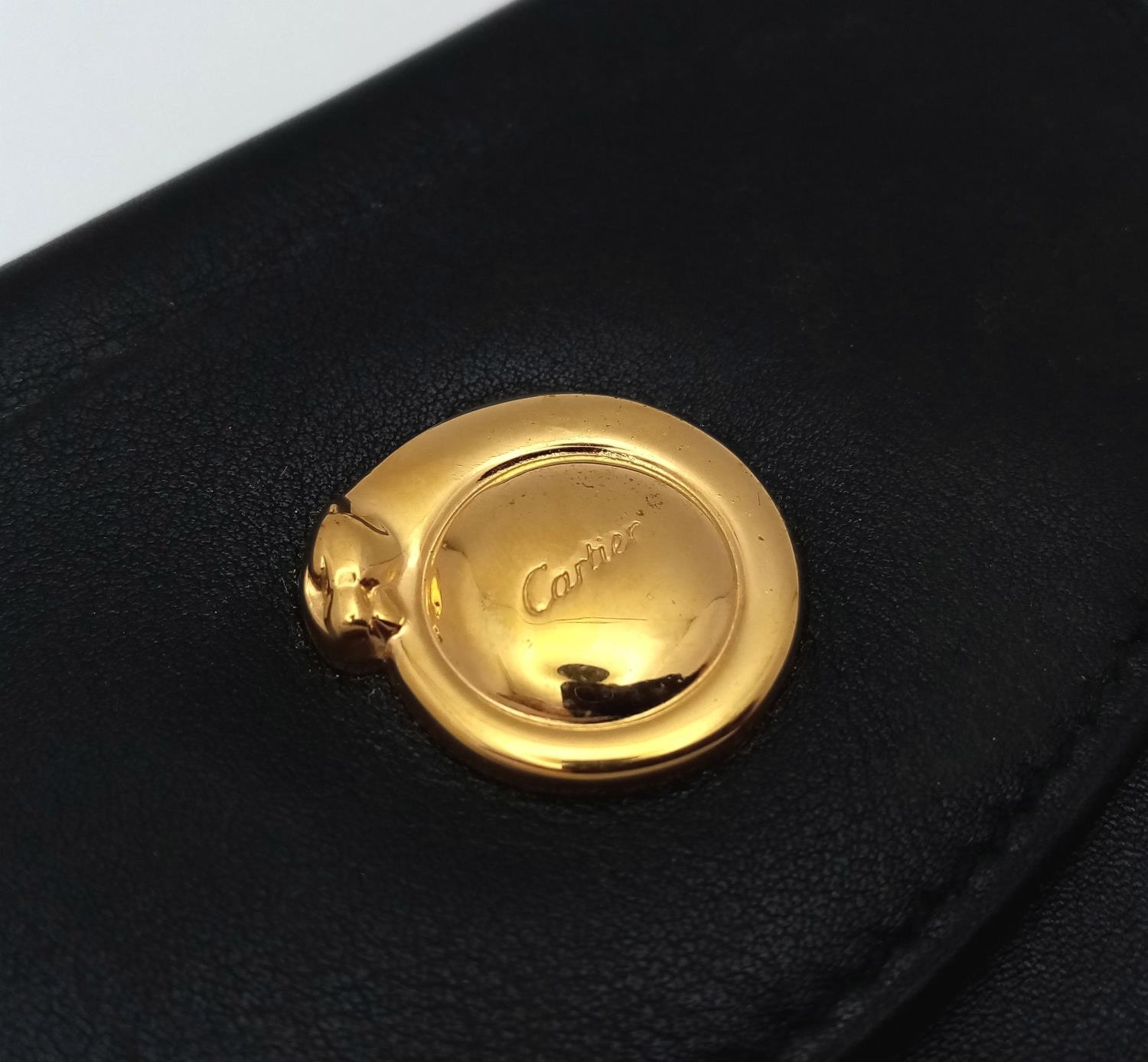 A Cartier Black Panther Coin Pouch. Leather exterior with gold-toned hardware and press stud - Image 8 of 10