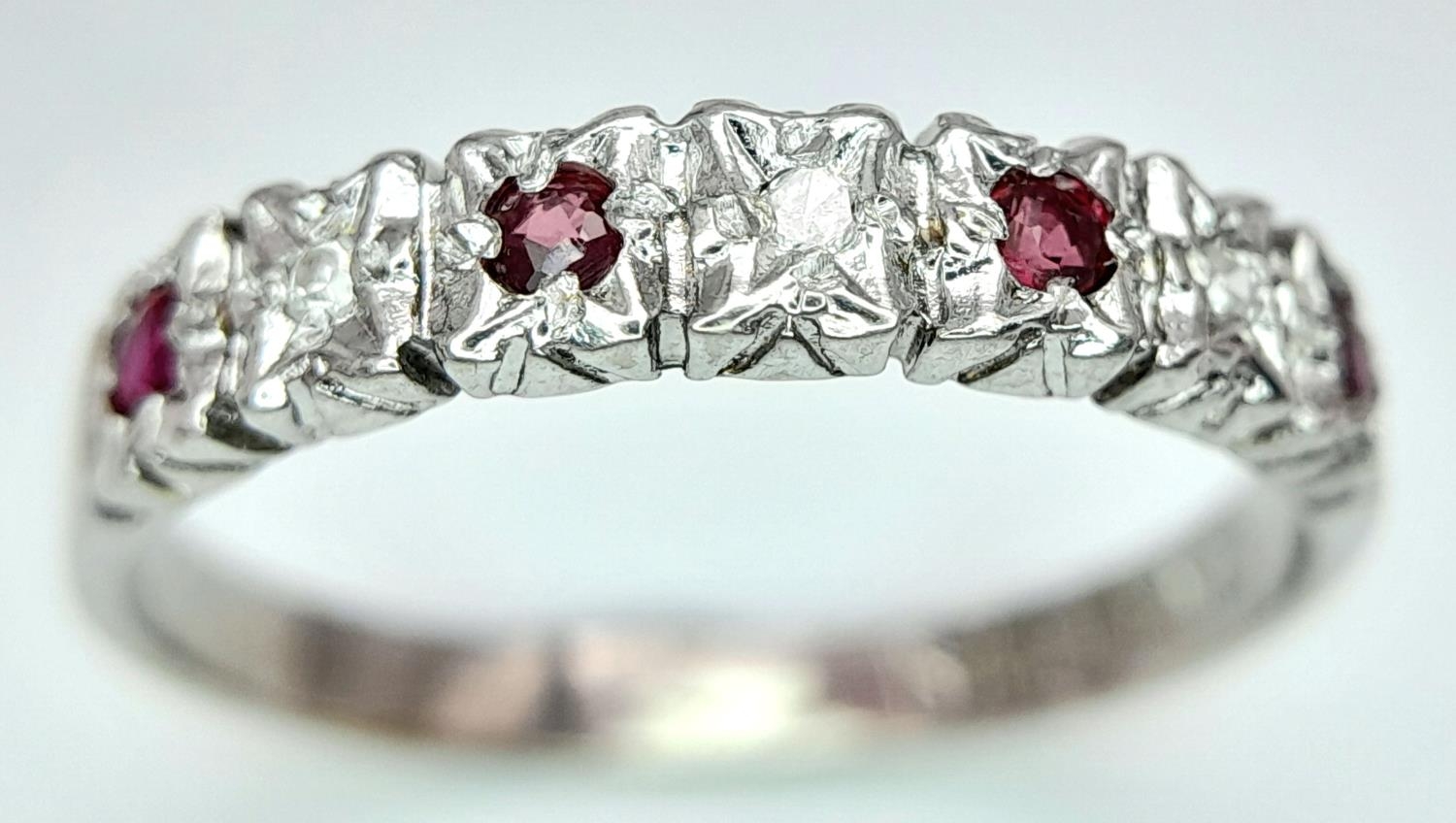 A 9K WHITE GOLD DIAMOND & RUBY BAND RING 1.8G SIZE N 1/2. ref: SPAS 9014