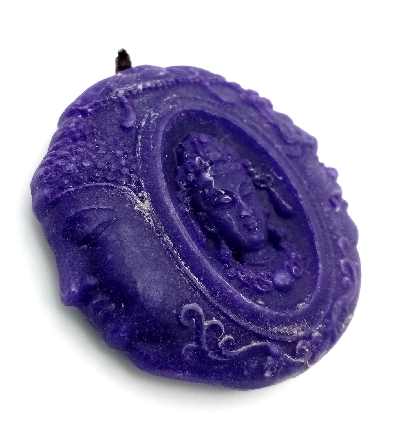 A Lavender Jade Devil and Angel Pendant. Highly symbolic of todays times. Circular shape. 5cm. - Image 2 of 5