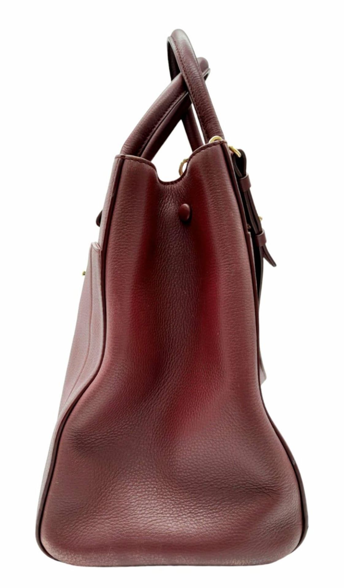 A Chanel Neo Executive Leather Tote Bag. Burgundy leather exterior with gold tone hardware and two - Image 2 of 11