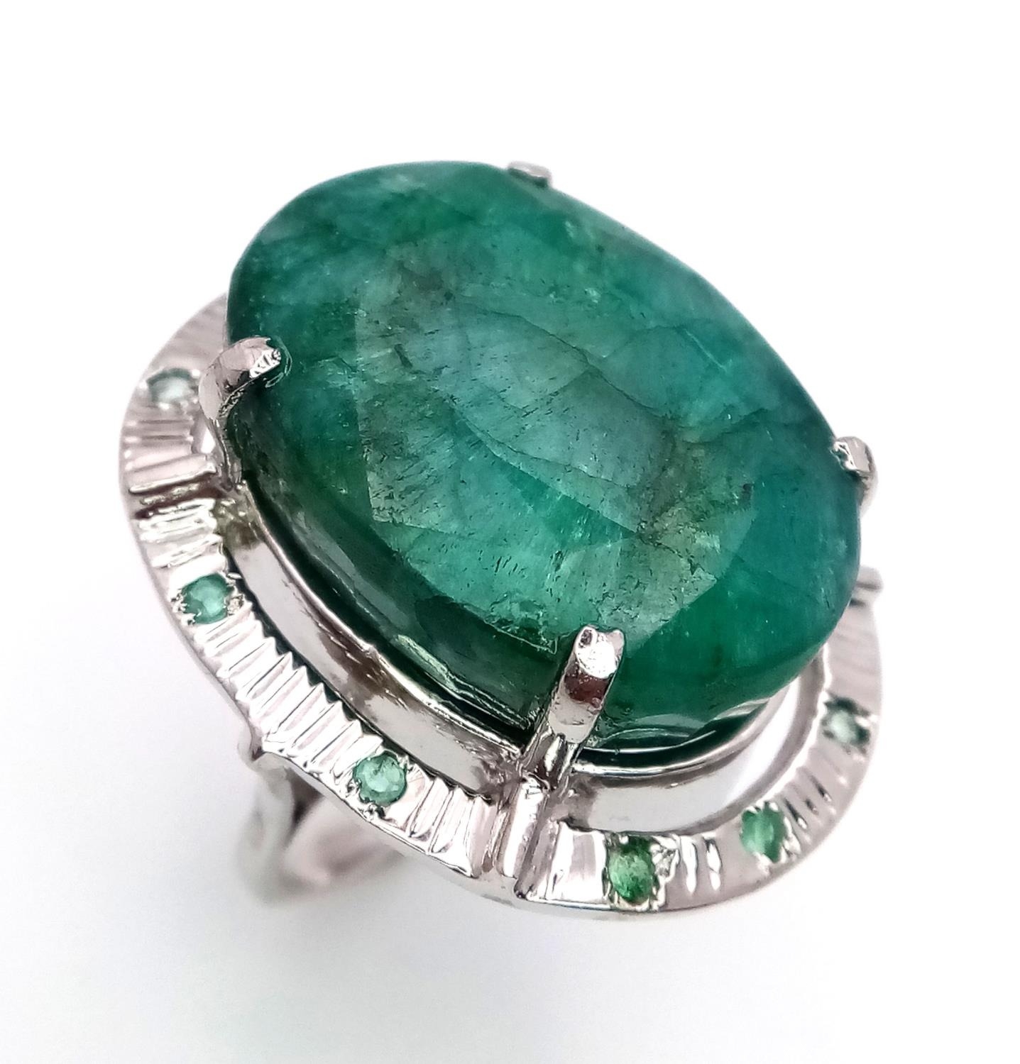 A 48ct Brazilian Emerald Silver Ring. Set in 925 Sterling Silver. W- 17.5g. Comes in a