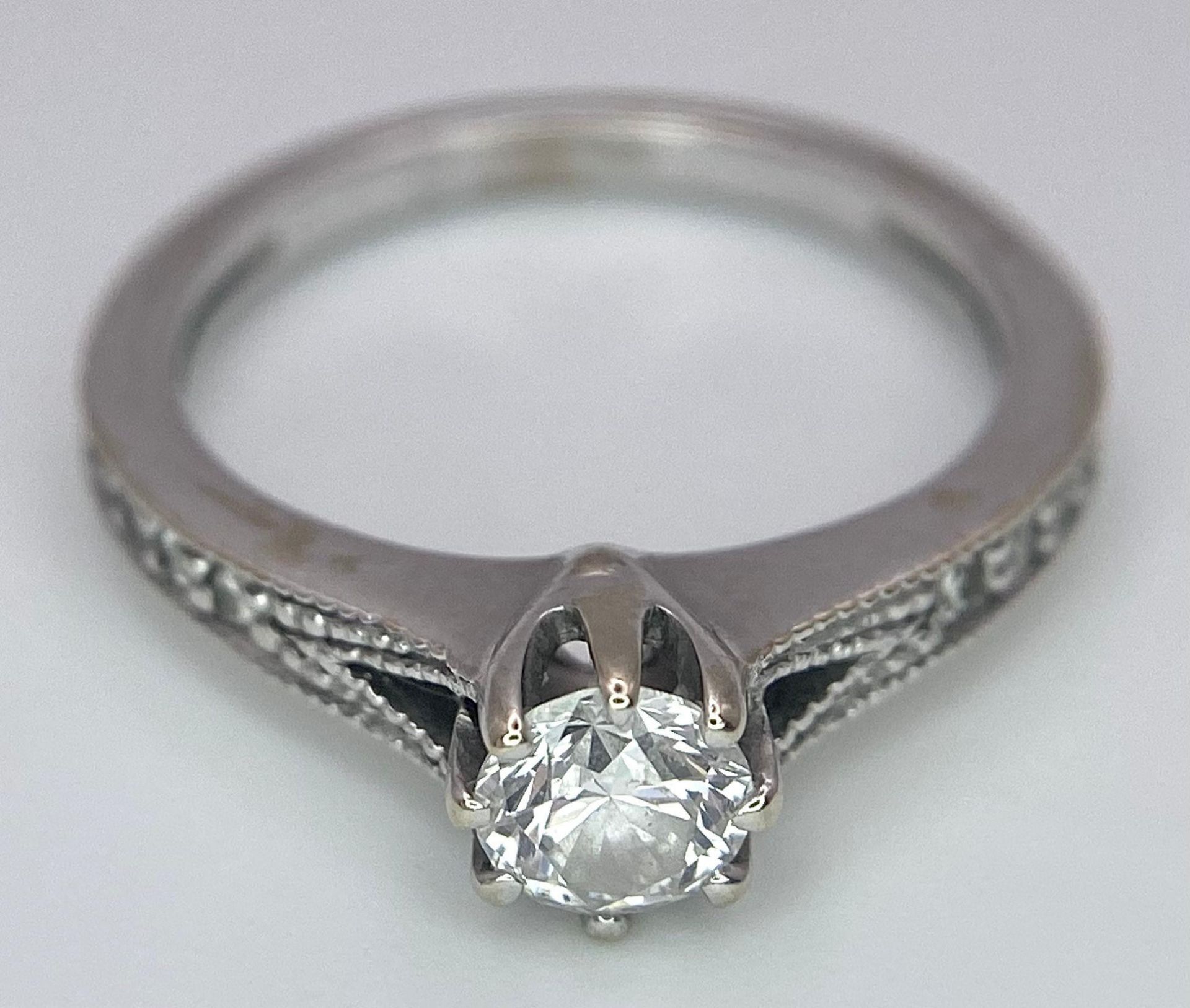 Two Different Style 18K White Gold Rings. A 0.50ct brilliant cut central diamond with diamond - Image 2 of 8