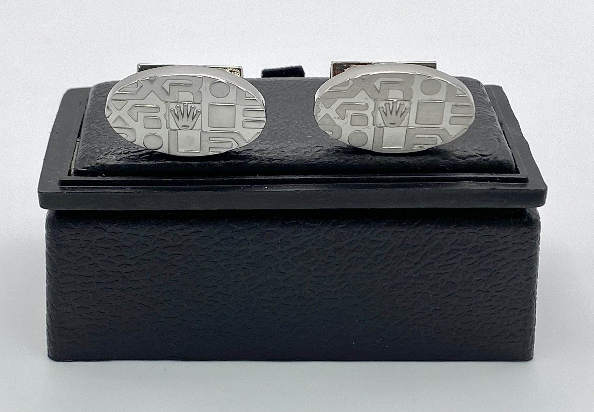 A white metal pair of modern ROLEX cufflinks, in a presentation box (not Rolex). We understand, - Bild 3 aus 7