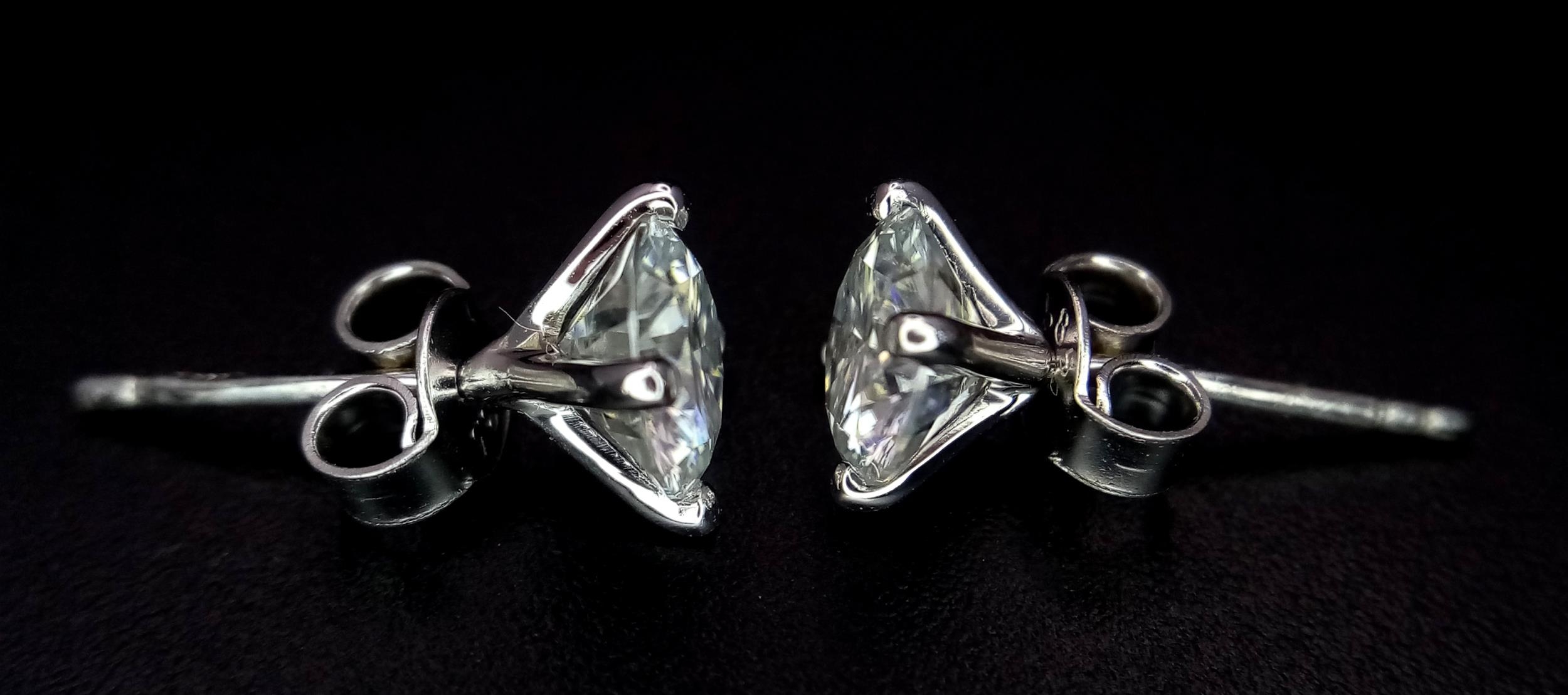 A Pair of 1ct Moissanite Earrings on 14K White Gold. Both stones come with a GRA certificate. 1.3g - Image 2 of 5