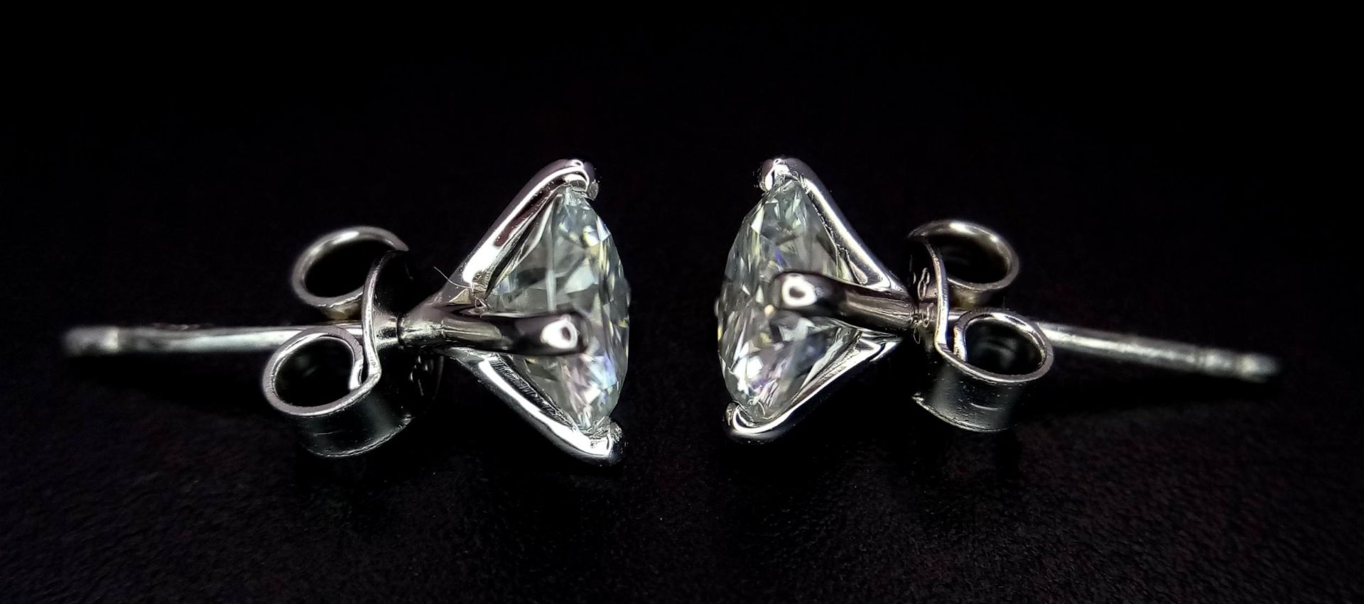 A Pair of 1ct Moissanite Earrings on 14K White Gold. Both stones come with a GRA certificate. 1.3g - Image 2 of 5