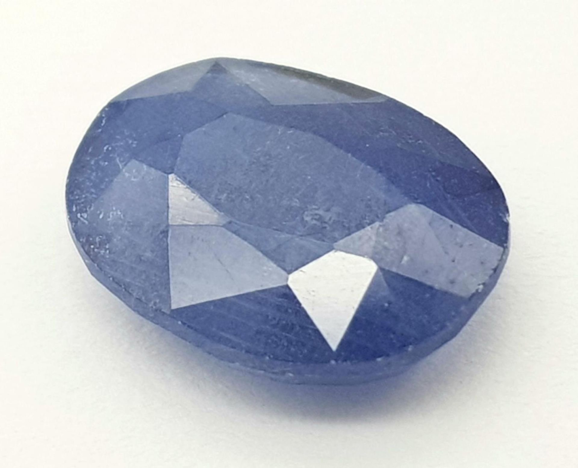 A 6.50ct African Blue Sapphire - AIG Certified.