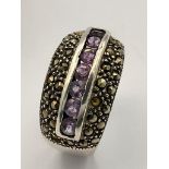 Vintage SILVER MARCASITE RING,set with AMETHYSTS to centre. Complete with ring box. Size Q 1/2 - R.