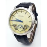 A Large Cased Fossil Automatic Gents Watch. Black leather strap. Stainless steel case - 48mm. Yellow