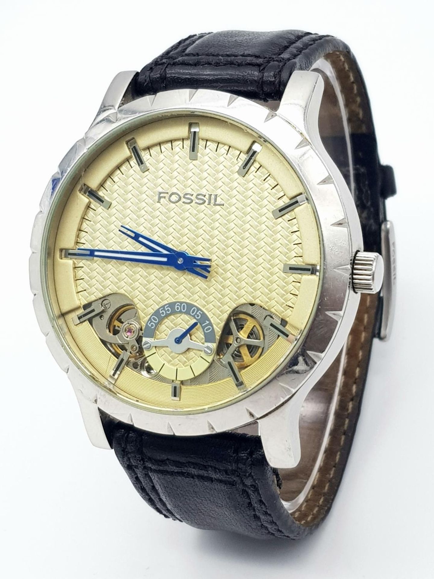 A Large Cased Fossil Automatic Gents Watch. Black leather strap. Stainless steel case - 48mm. Yellow
