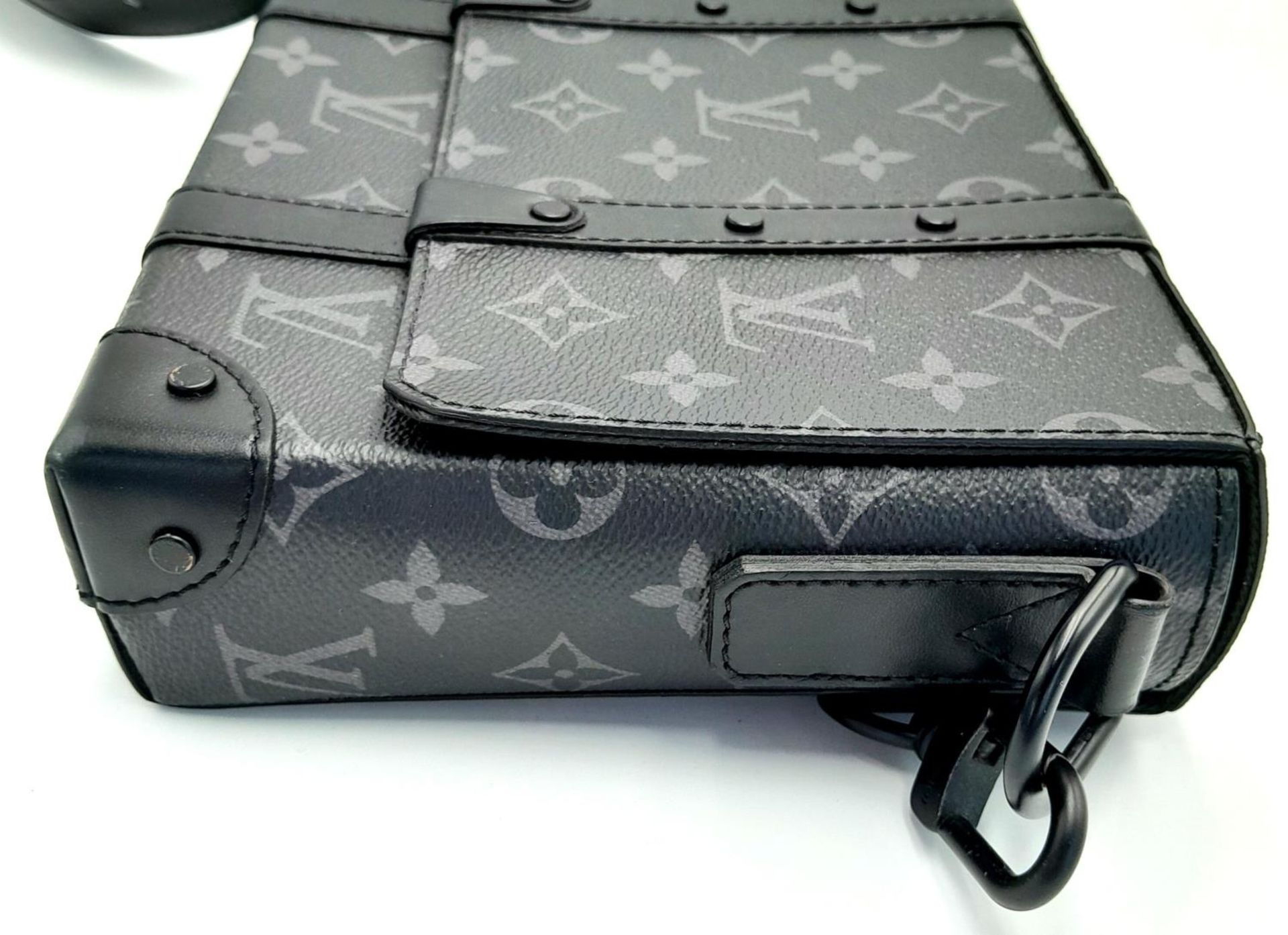 A Louis Vuitton Black Eclipse Trunk Messenger Bag. Monogramed canvas exterior with black-toned - Image 3 of 10