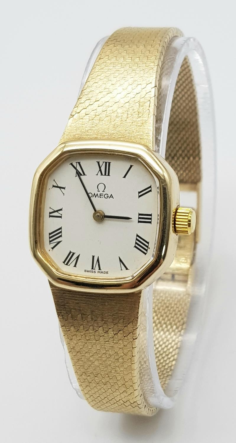 A Beautiful Vintage Omega 9K Gold Ladies Mechanical Watch. 9k gold bracelet and case - 23mm. White