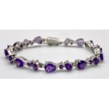 An Amethyst Tennis Bracelet. Set in 925 Sterling Silver. 27ctw. W-17.20g.19cm. Ref: HV-2170