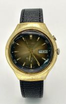 A Vintage Seiko Bell-Matic 17 Jewels Automatic Gents Watch. Black leather strap. Gilded case - 38mm.