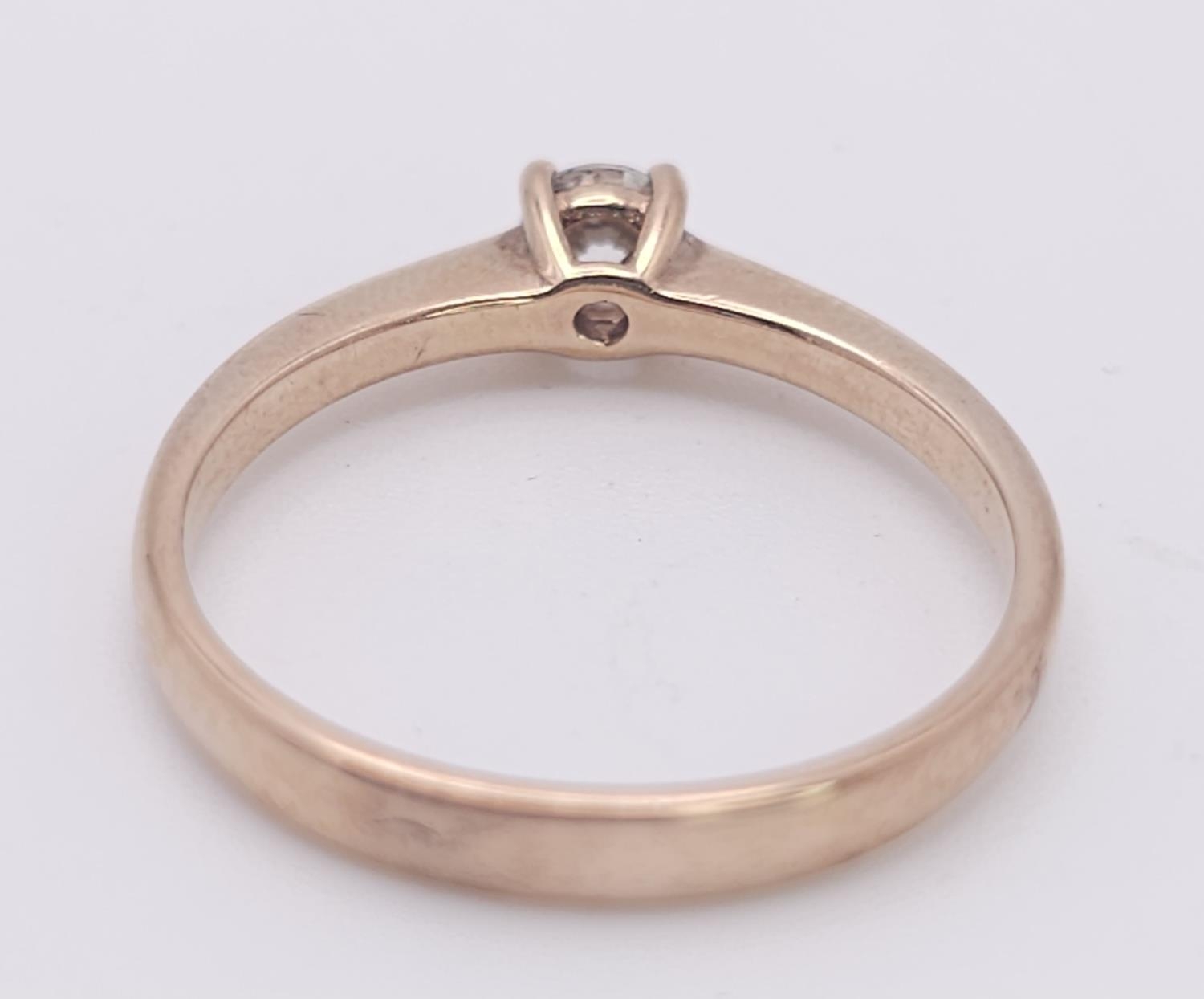 A 9K Rose Gold Diamond Solitaire Ring. 0.10ct round cut diamond. Size N. 2g total weight. - Image 4 of 7