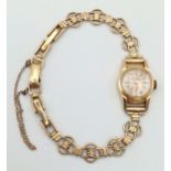 A 9 and 18K Gold Vintage Ladies Mechanical Mudu Watch. 9k gold bracelet. 18k gold case. Mechanical