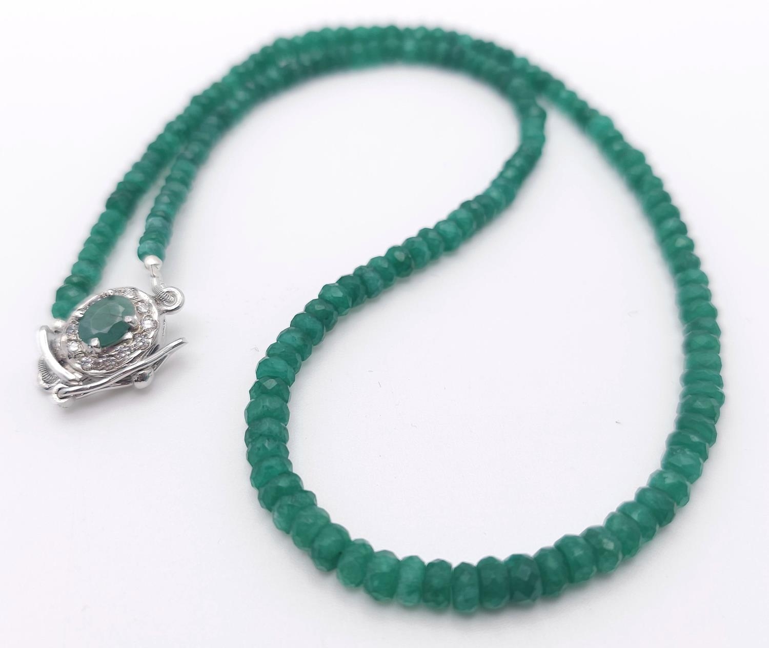A 95ctw Emerald Gemstone Rondelle Single Strand Necklace - with Emerald and 925 Silver clasp.