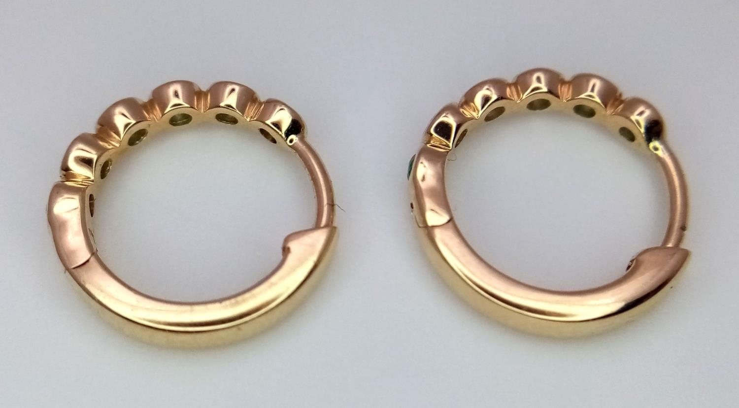 A Pair of Messika 14K Gold Small Emerald Hoop Earrings. 1.7g - Image 2 of 3