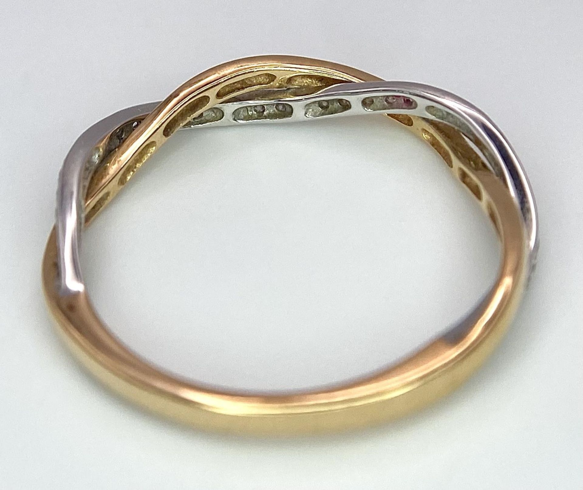 A job lot of three 18 K yellow gold items, consisting of a diamond bangle with an elegant cross over - Image 6 of 10