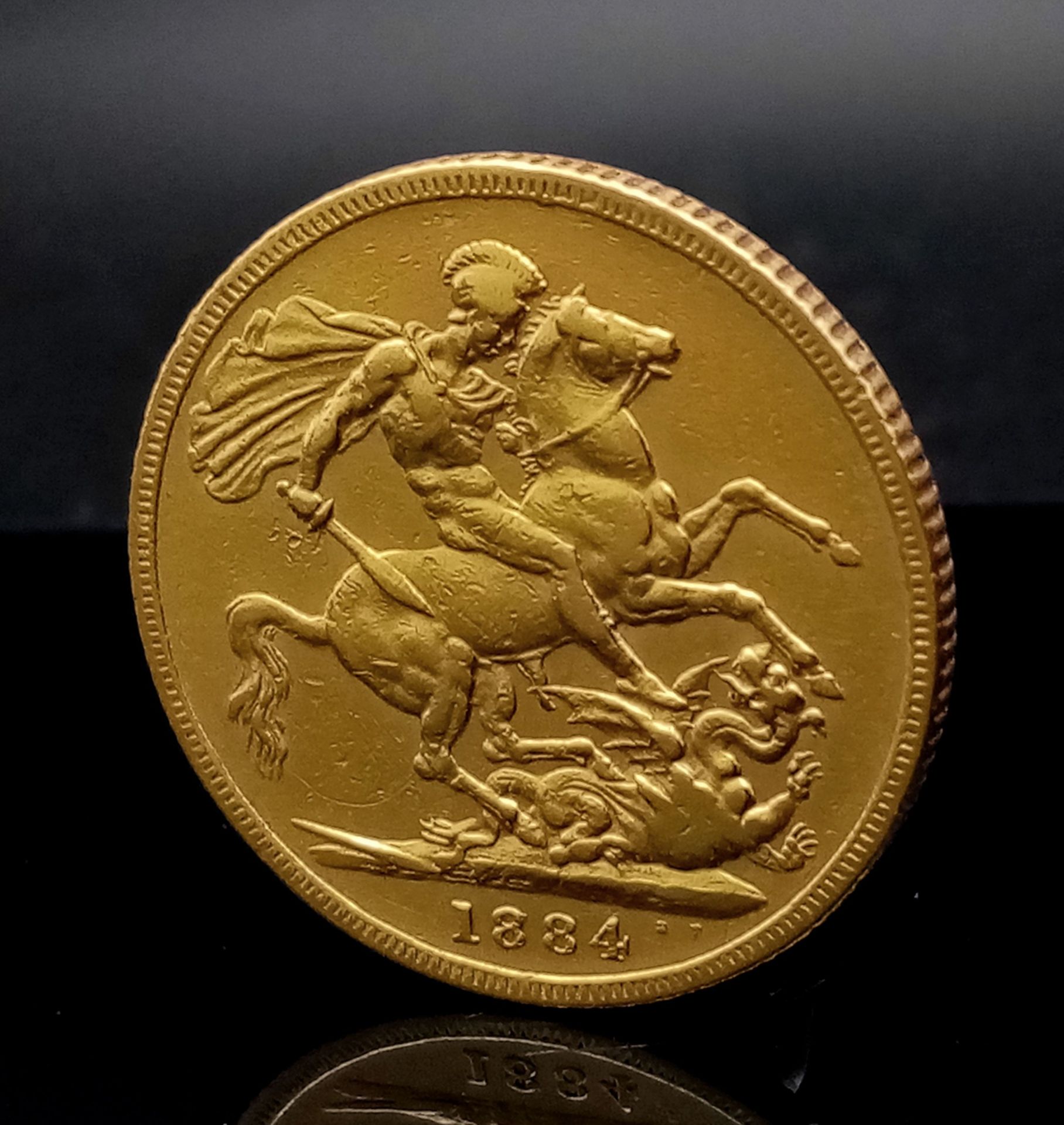 An 1884 Queen Victoria 22K Gold Full Sovereign Coin. Good definition. - Bild 2 aus 3