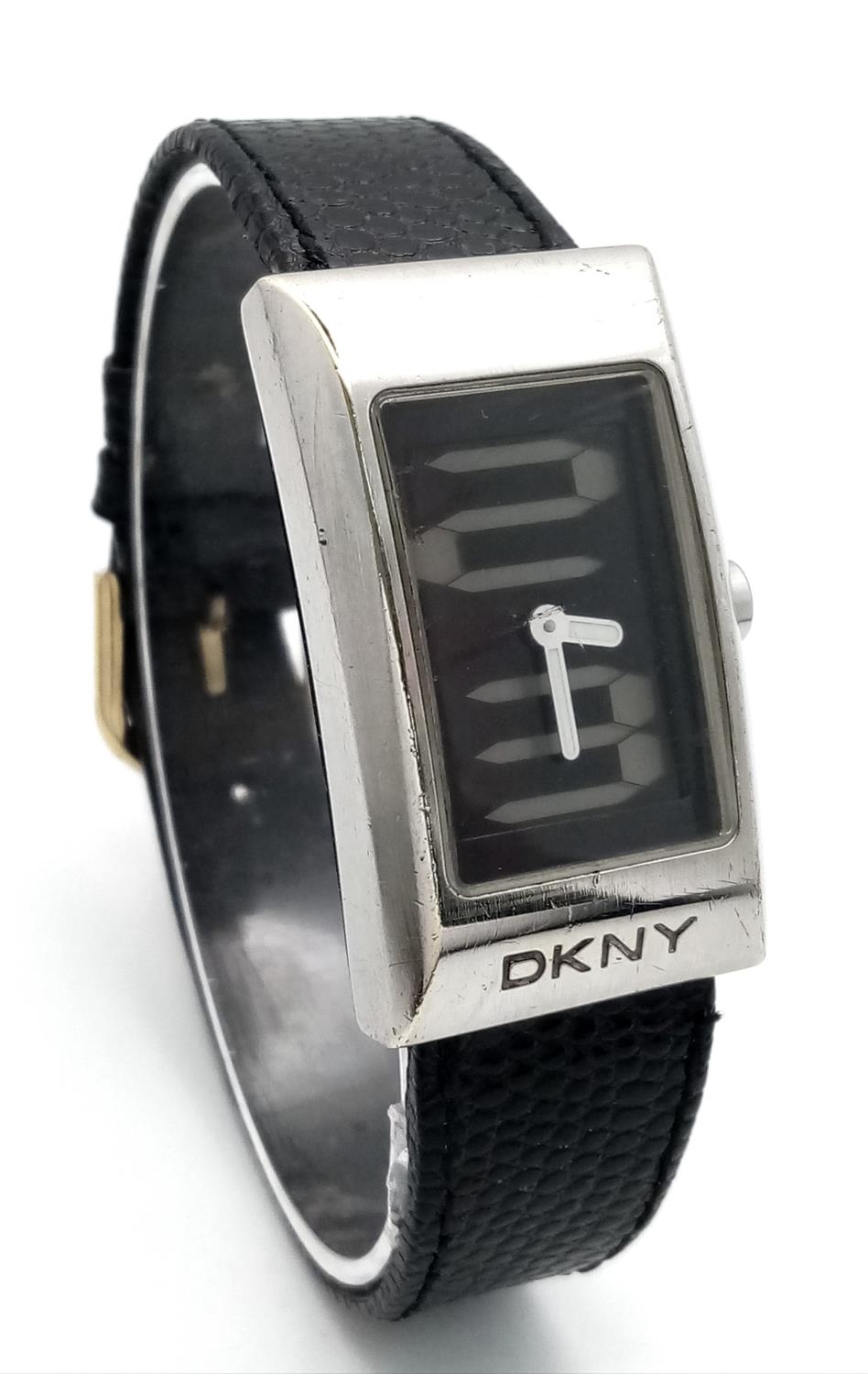 A DKNY Quartz Ladies Watch. Black leather strap. Stainless steel case - 24mm. Analogue/digital dial. - Image 5 of 6