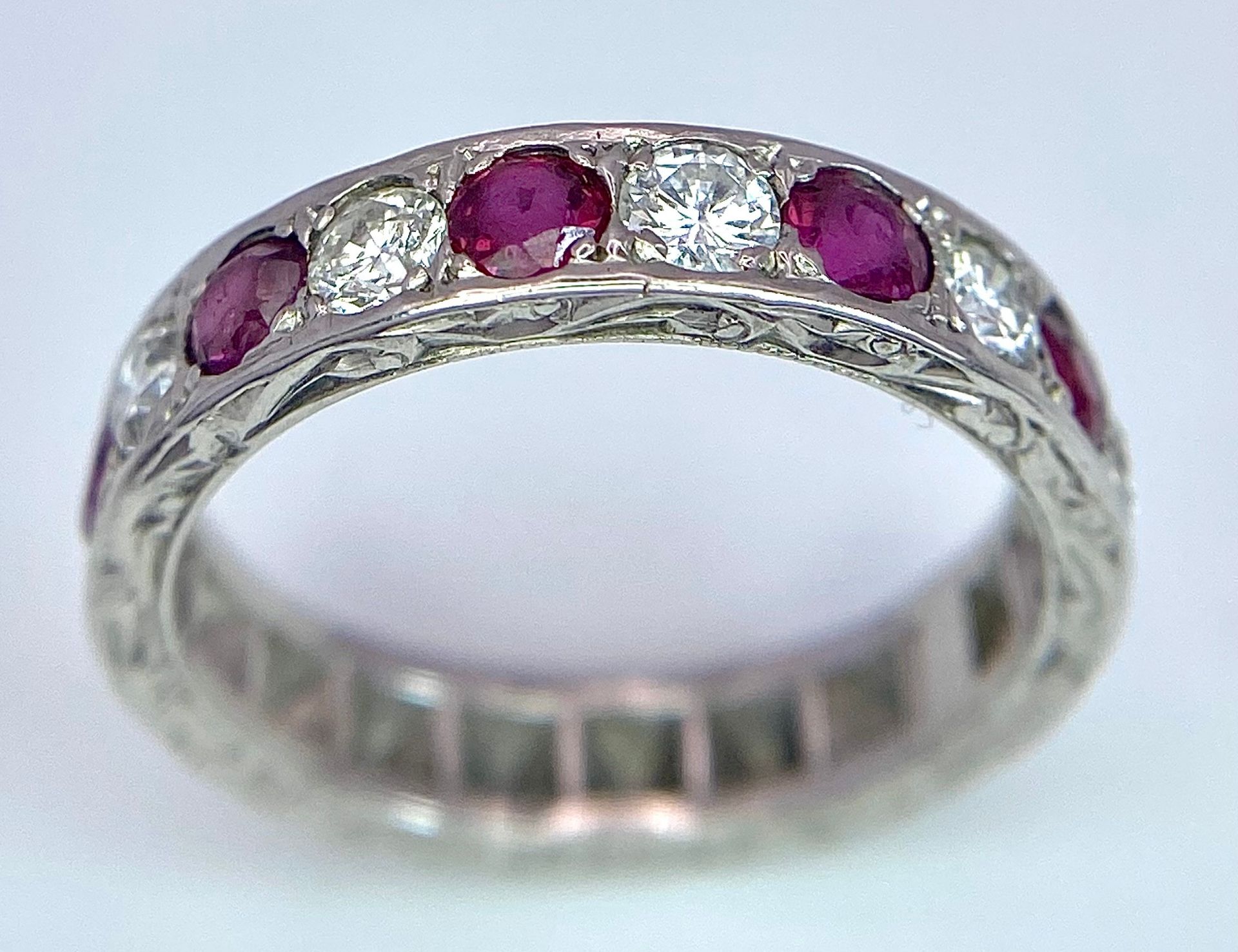 AN 18K WHITE GOLD DIAMOND & RUBY BAND RING. 0.25ctw, size L, 4.1g total weight. Ref: SC 9038 - Image 2 of 4