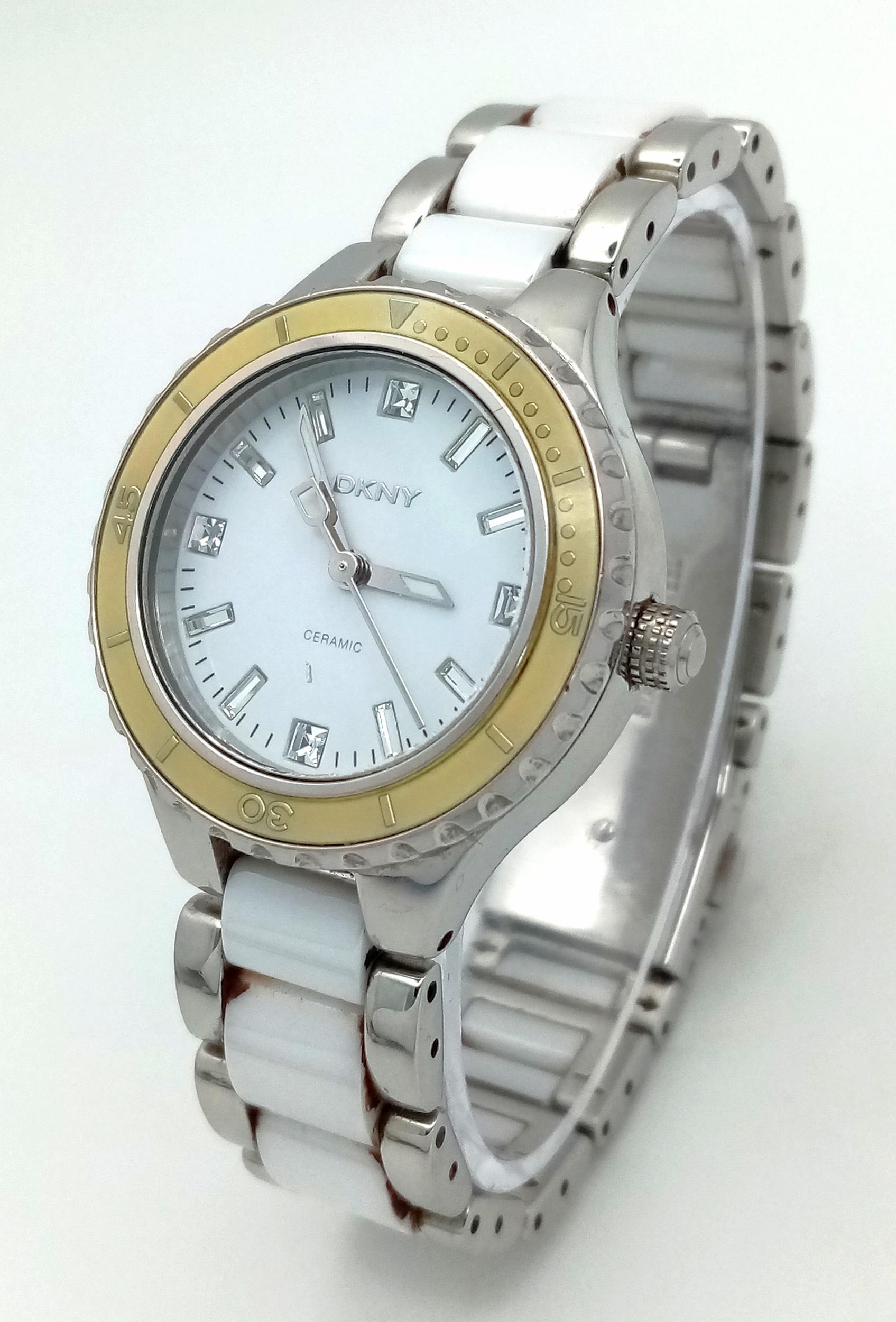 A Ladies Ceramic Bracelet Quartz Date Watch by DKYN (Donna Karen New York). 35mm Including Crown. - Image 2 of 7