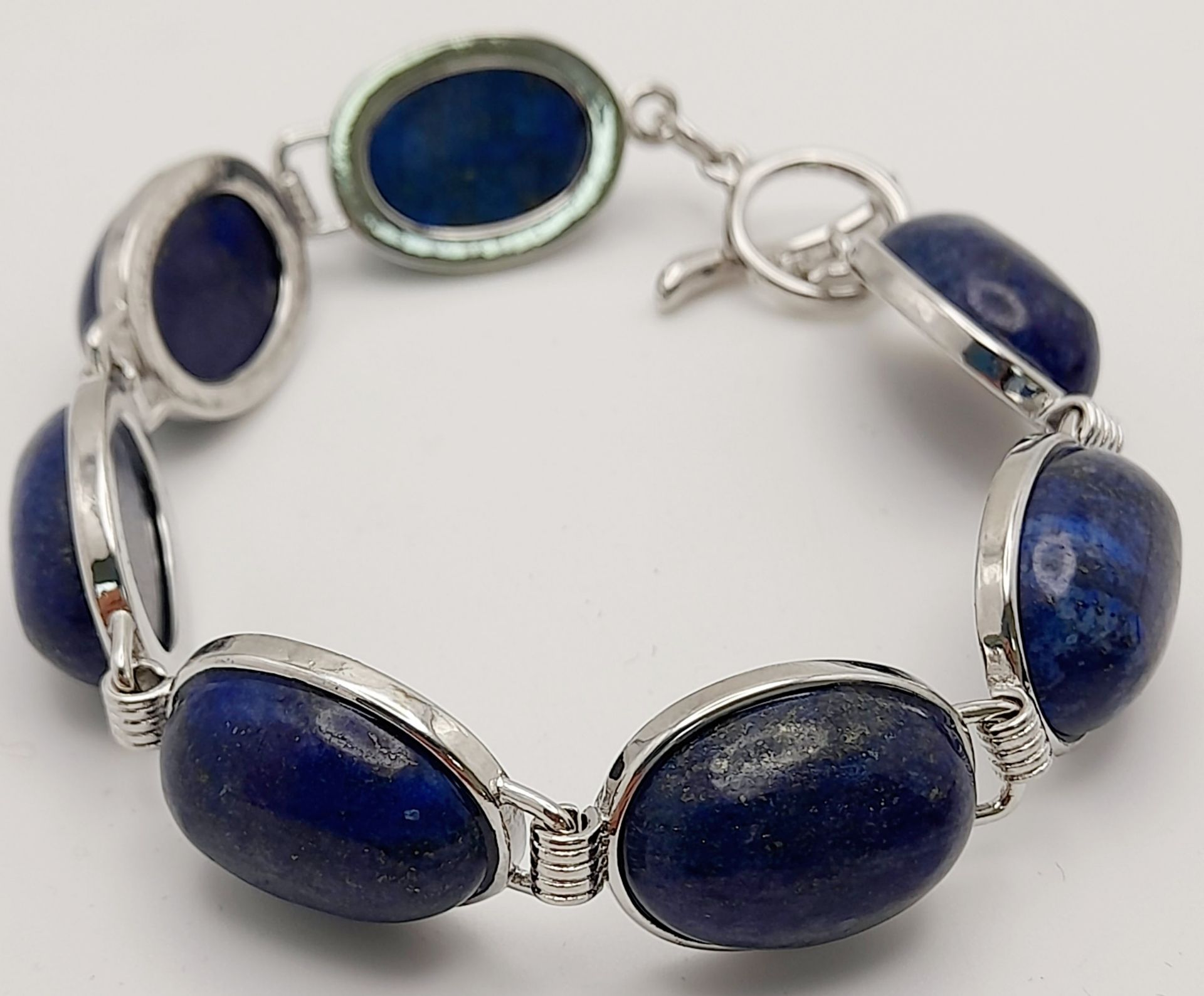 A Lapis Lazuli Jewellery Suite. Includes: necklace, earrings, bracelet and ring - size S. - Bild 4 aus 6