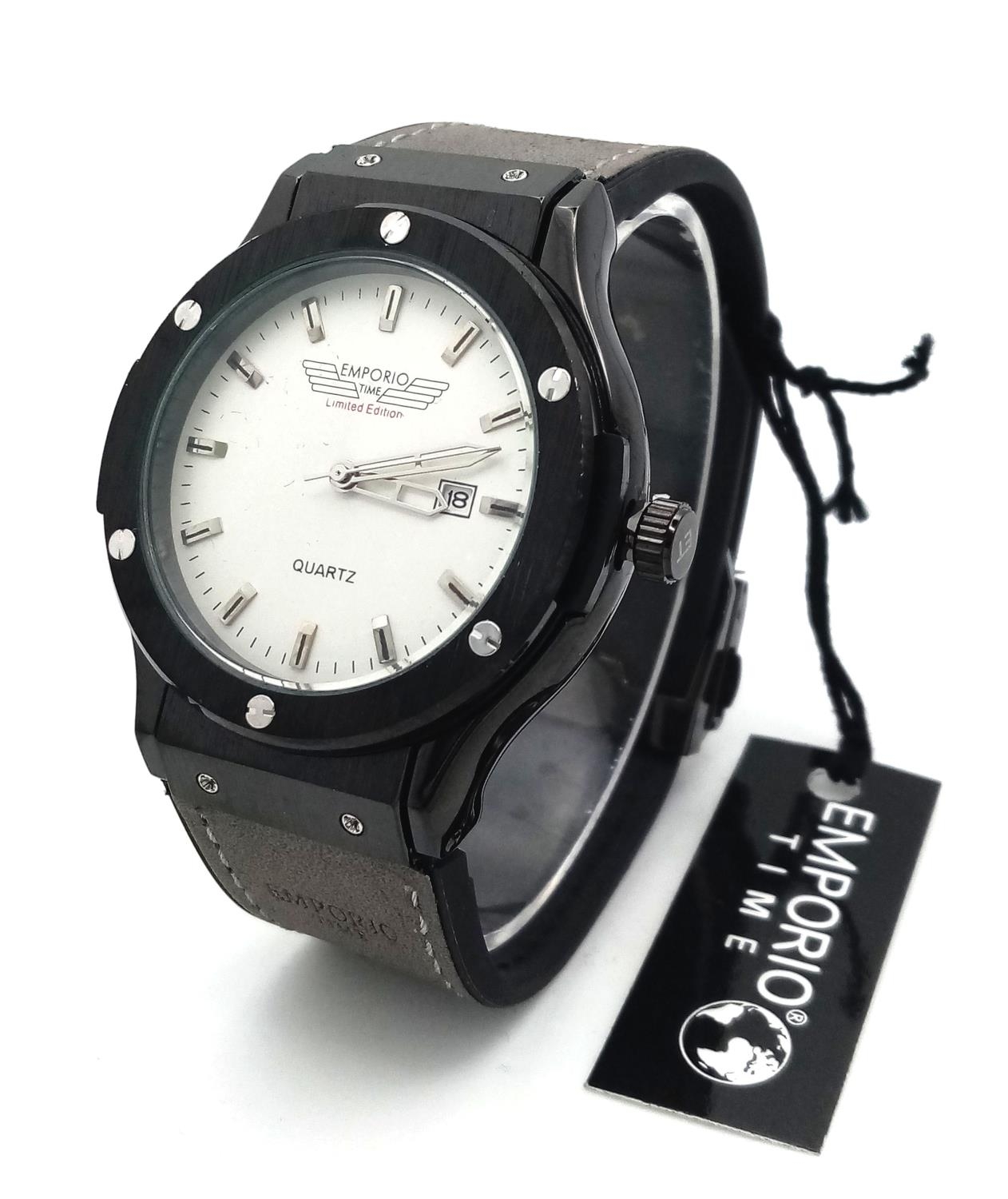 An Emporio Limited Edition Quartz Gents Watch. Grey leather strap. Stainless steel and ceramic