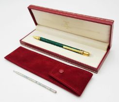 A Cartier Ballpoint Pen with Malachite Lacquer Decoration. Comes with original Cartier case plus