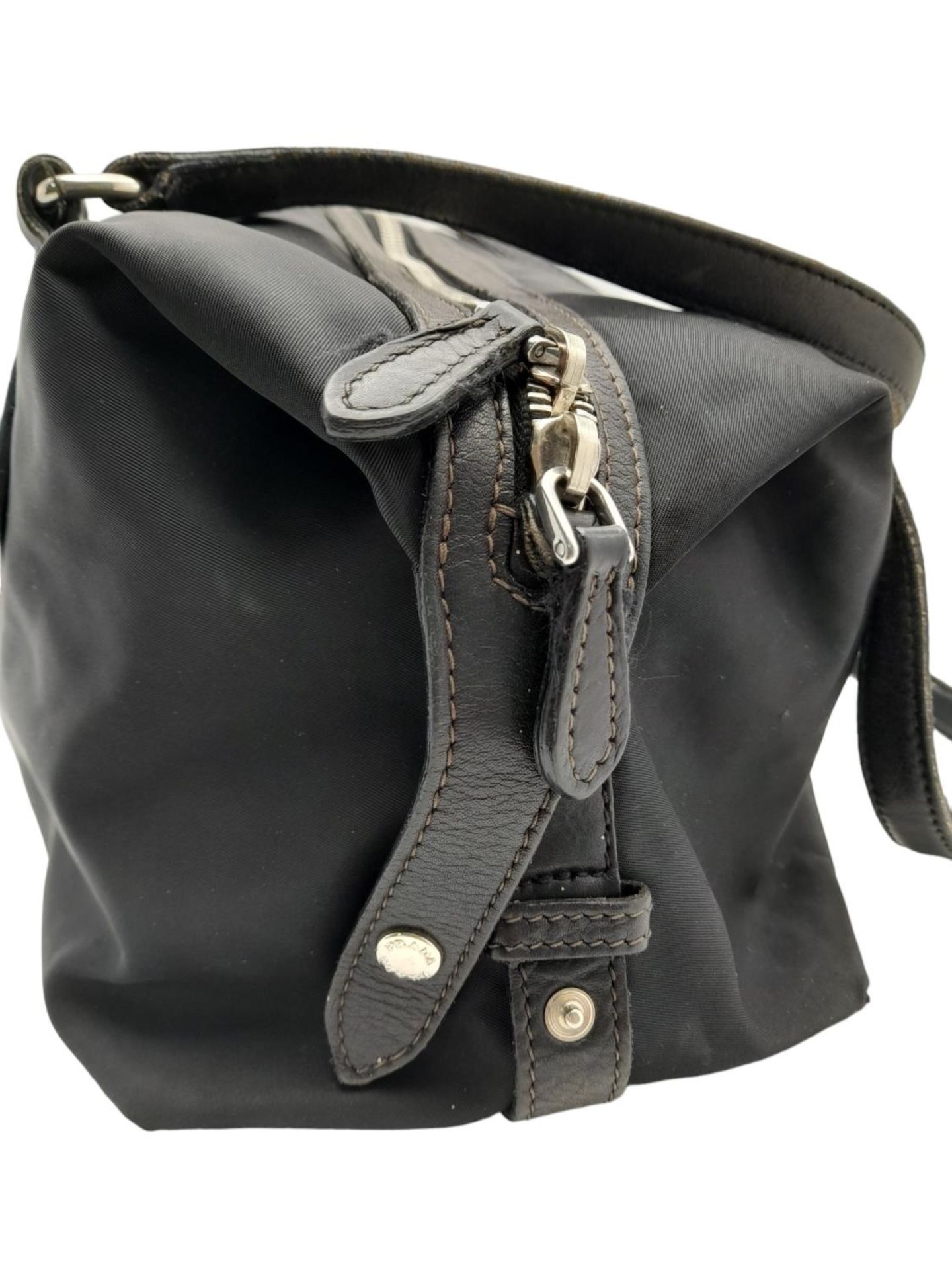 A Prada Black Tessuto Satchel. Textile exterior with leather trim, silver-tone hardware, a top zip - Image 5 of 7