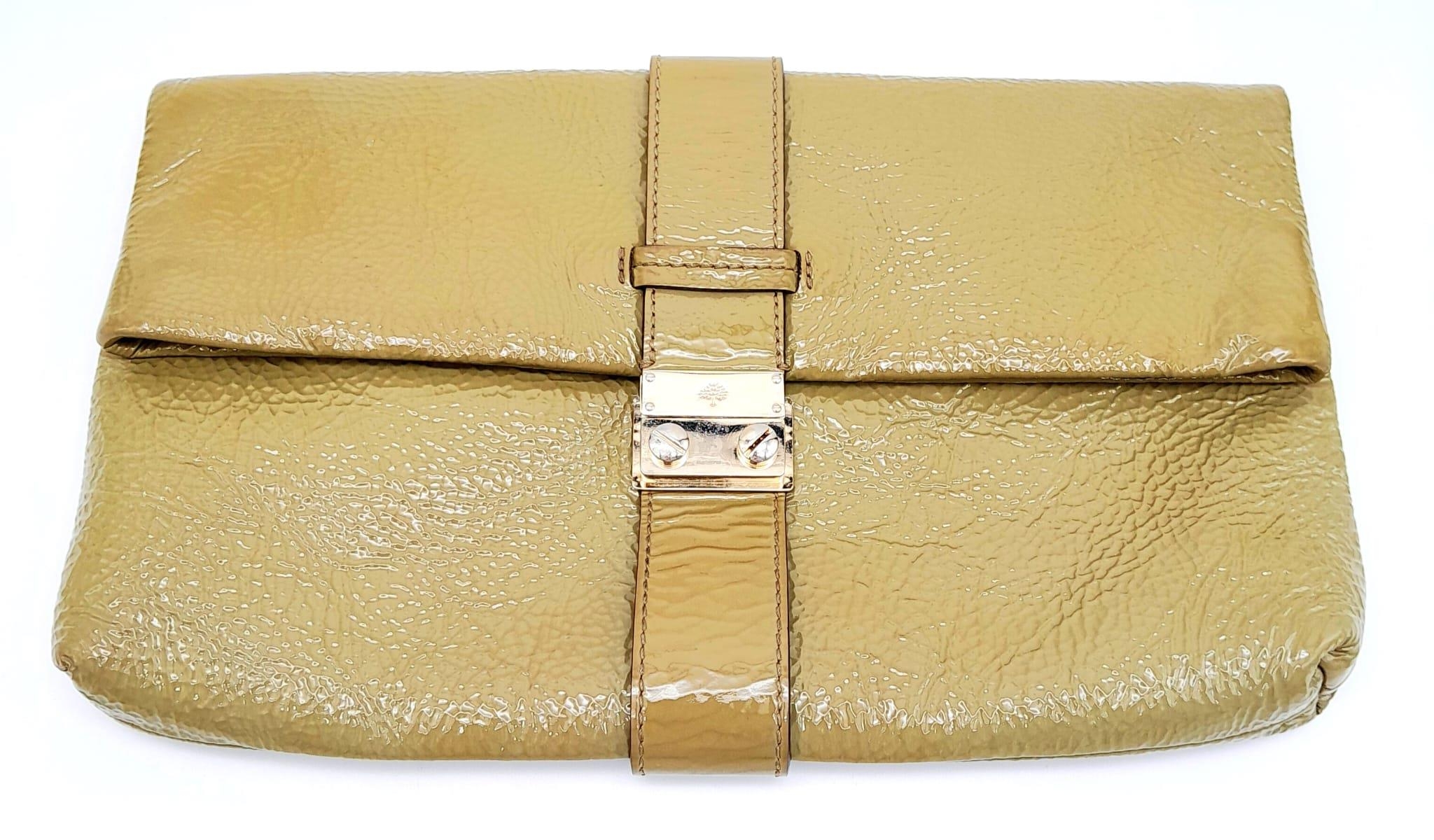 A Mulberry Harriet Khaki Leather Clutch Bag. Spongy patent leather exterior with gold-tone hardware,