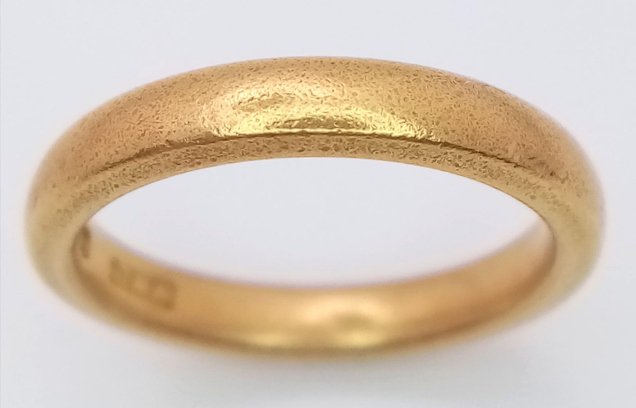 A Vintage 22K Yellow Gold Band Ring. 3mm width. Size K. 5.47g weight. Full UK hallmarks. - Image 2 of 4