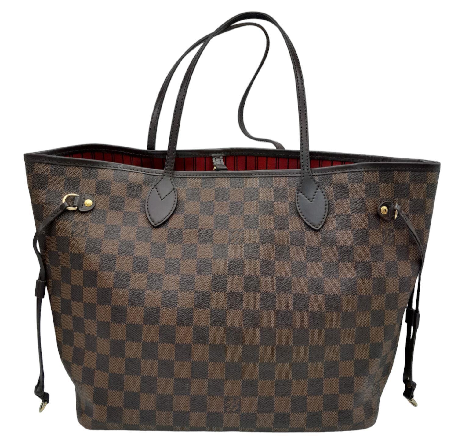 A Louis Vuitton Neverfull Damier Ebene Bag. Coated canvas exterior with leather trim, gold-toned
