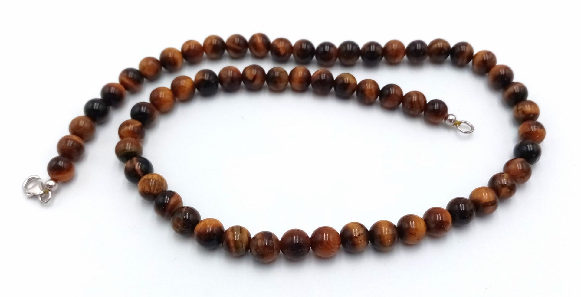 A Tigers Eye Beaded Necklace with Silver Clasp. 8mm beads. 46cm. - Bild 4 aus 5