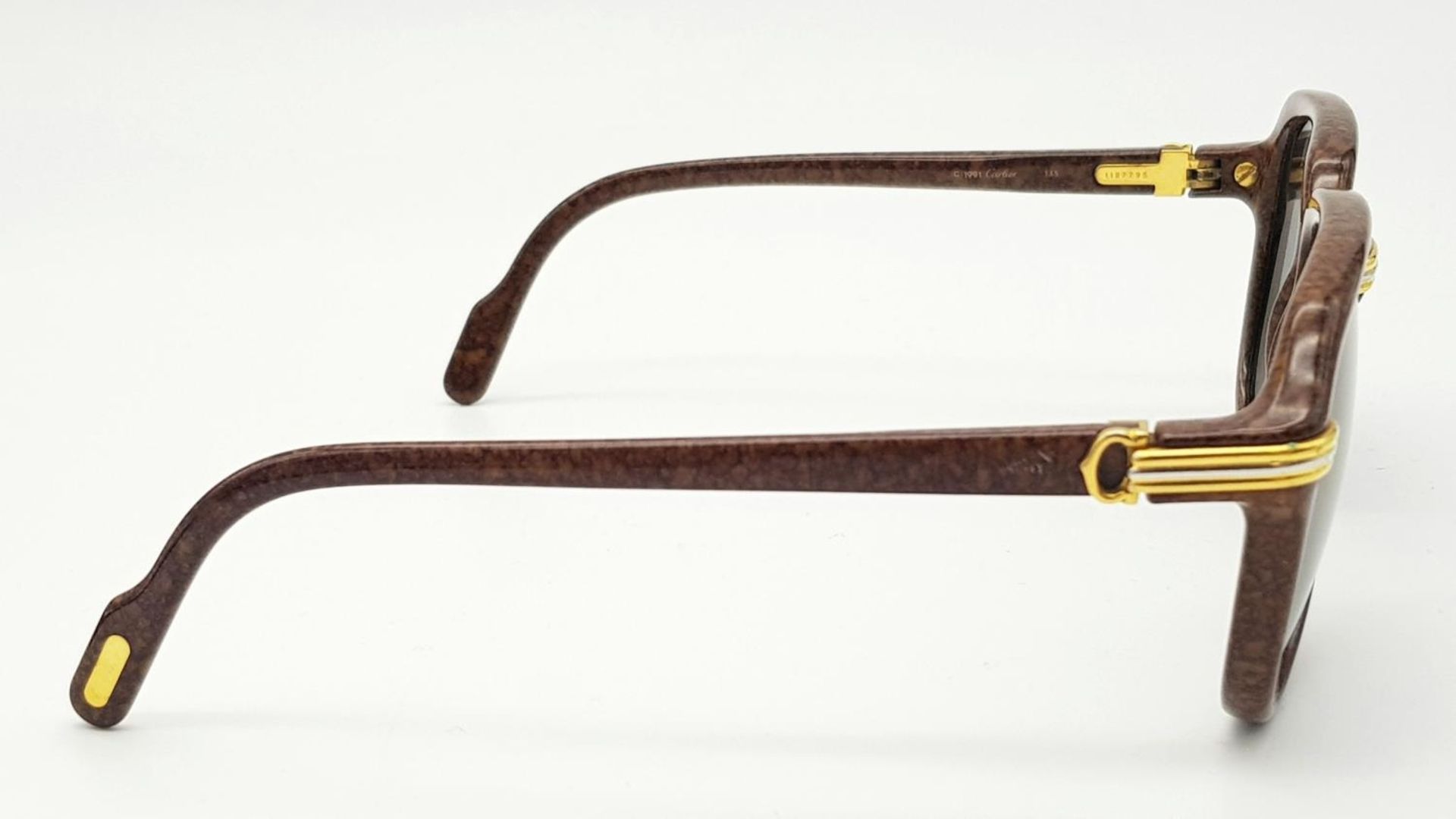 A Pair of Cartier Brown Vitesse Sunglasses. Elegant marble carbon frame with Cartier watermarks on - Image 4 of 9