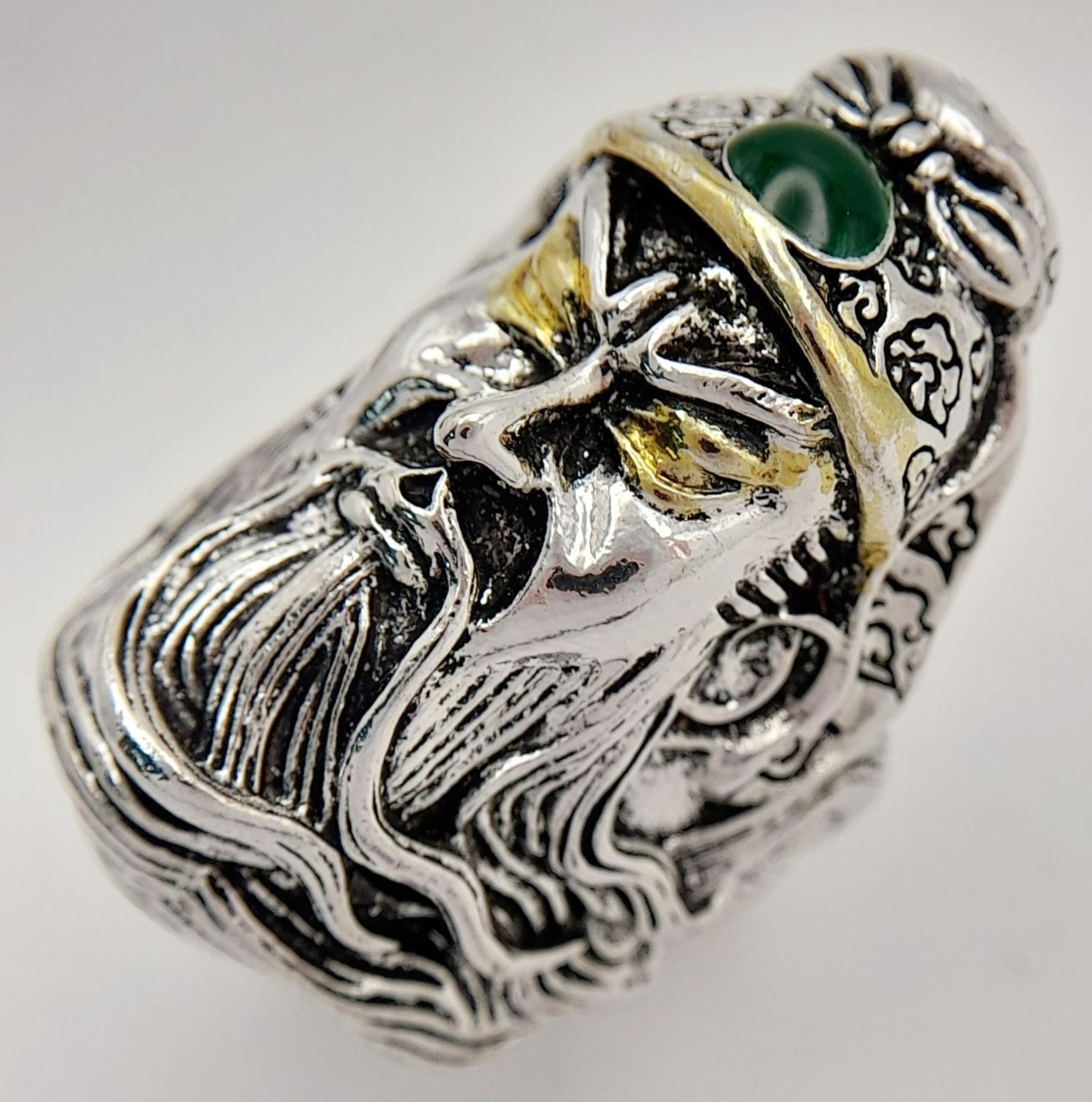 white metal (untested) Chinese Guan Yu ring with a green jade cabochon. Size: adjustable, weight: