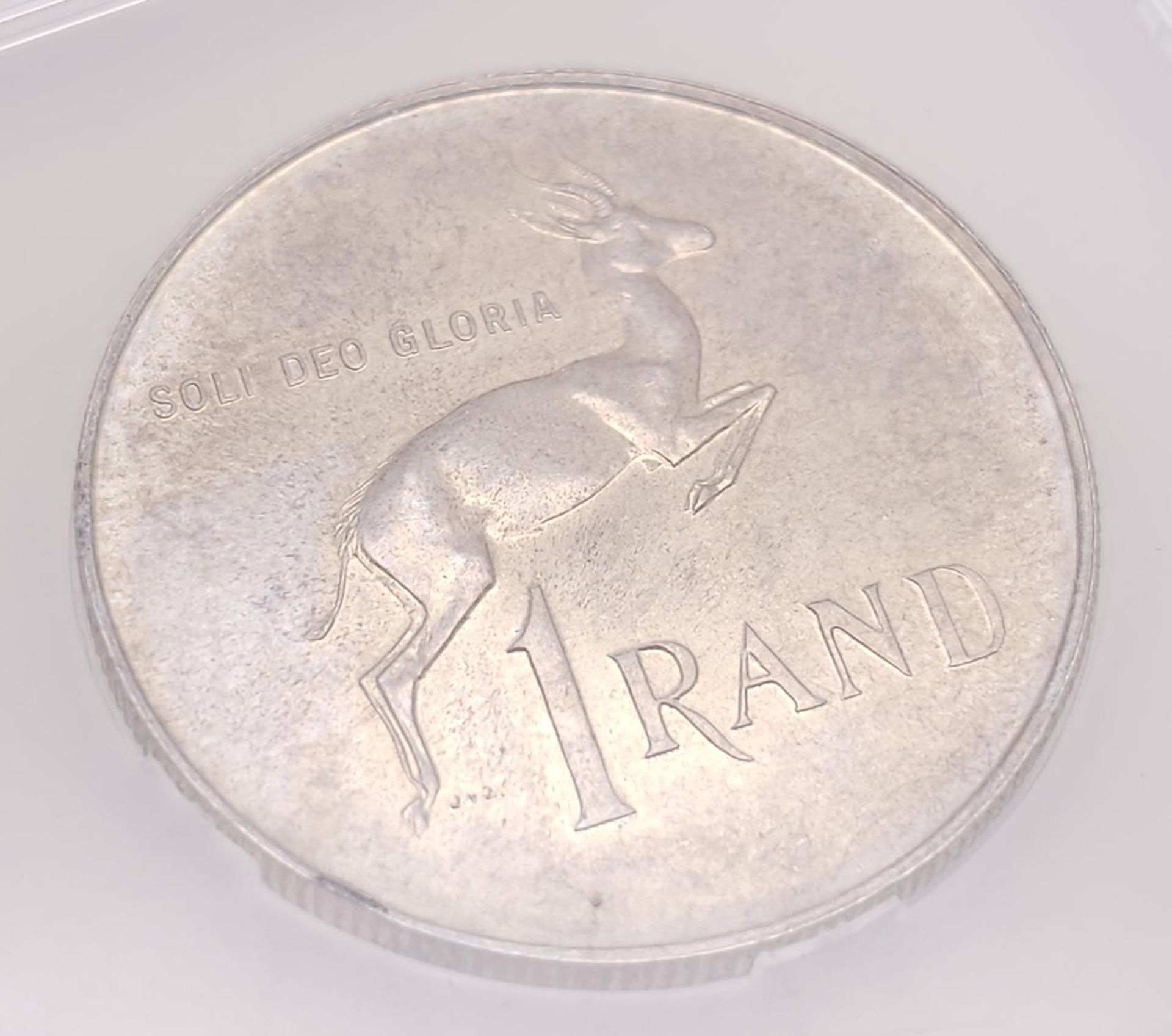 A 1965 Silver South African 1 Rand Coin. Encapsulated. - Image 3 of 3